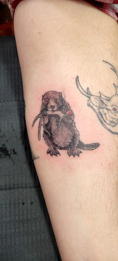 Explore cheek tattoo ideas, creative tattoo ideas in Pittsburg, available at NeonMoon Tattoo