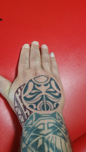 Tattoo Shop «Divine Torture», reviews and photos, 3223 Curry Ford Rd, Orlando, FL 32806, USA