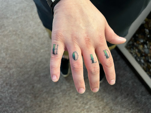 Explore navel tattoo ideas, creative tattoo ideas in Jefferson, available at Slammin Ink Tattoo