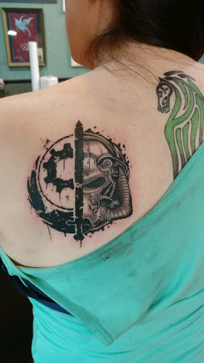 Explore leg tattoo ideas for men, creative tattoo ideas in Englewood, available at Phantom 8 Tattoo & Piercing