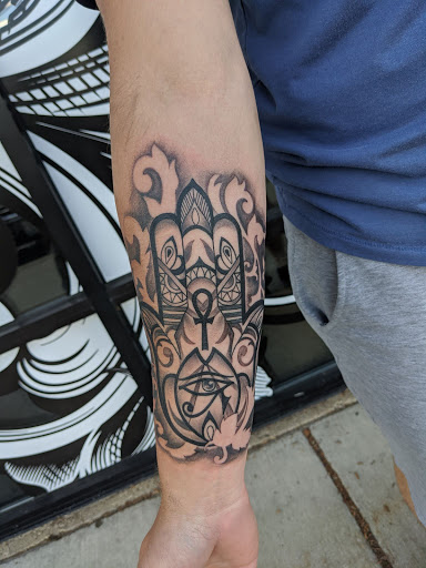 Explore good neck tattoo ideas, creative tattoo ideas in Crystal Lake, available at Monster Ink Tattoo & Piercing Studio