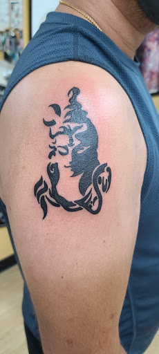 Explore throat tattoo ideas for males, creative tattoo ideas in Stafford, available at Virtue Tattoo