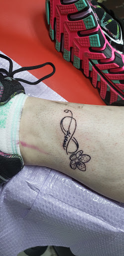 Explore minnie mouse tattoo ideas, creative tattoo ideas in Fort Worth, available at Fort Worth Tattoo Shop