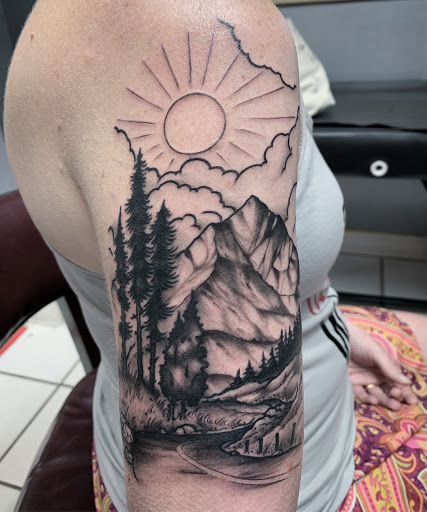 Tattoo Shop «Mine Shaft Tattoo & Piercing», reviews and photos, 8160 S Main St, Helen, GA 30545, USA