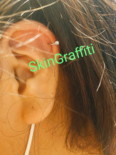 Find under the breast tattoo ideas for your next unique tattoo in Athens at SkinGraffiti Tattoo & Piercing