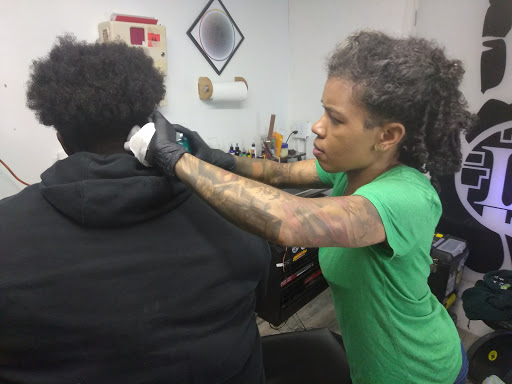 Explore dahlia tattoo ideas, creative tattoo ideas in Atlanta, available at Iron Palm Tattoos & Body Piercing Atlanta