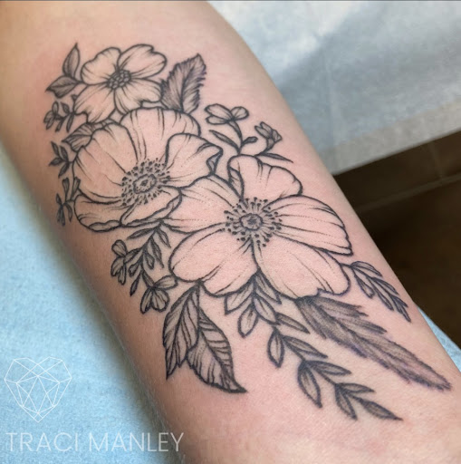 Explore lion and lamb tattoo ideas, creative tattoo ideas in Spokane, available at Moms Custom Tattoo & Body Piercing