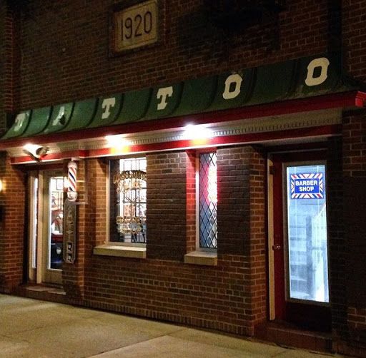 Tattoo Shop «Consolidated Tattoo», reviews and photos, 107 W Kearsley St, Flint, MI 48502, USA