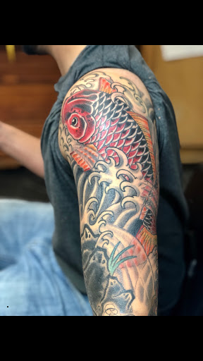 Explore angel chest tattoo ideas, creative tattoo ideas in Point Pleasant Beach, available at Slingin Ink Tattoo