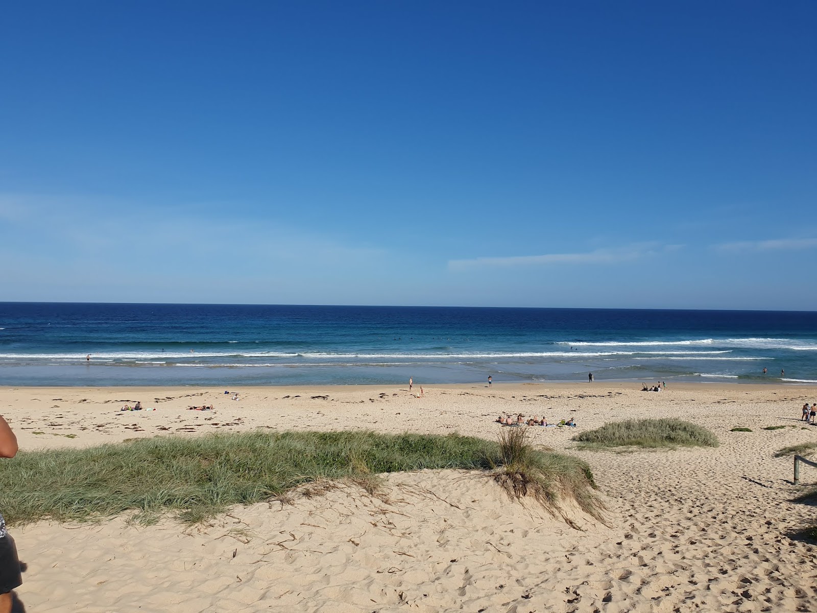 Foto van Inyadda Beach met blauw puur water oppervlakte