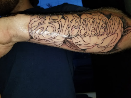 Explore watercolor flower tattoo ideas, creative tattoo ideas in Mexico, available at Uptown Ink Tattoo Parlor