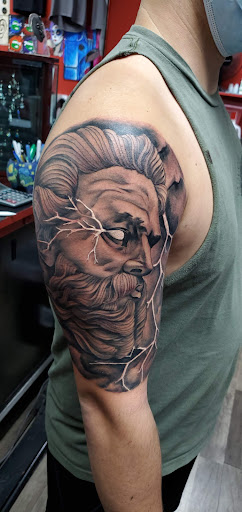 Explore back thigh tattoo ideas, creative tattoo ideas in Largo, available at Alchemy Tattoos and Body Piercings