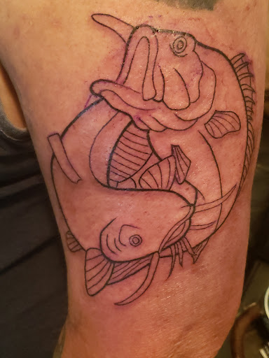 Explore snake tattoo ideas for females, creative tattoo ideas in Owasso, available at Skinworks Tattoo Studio