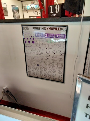 Explore mens rose tattoo ideas, creative tattoo ideas in Peoria, available at Mad Tattoo and Piercing