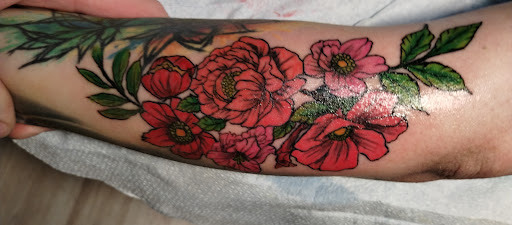 Explore inner arm tattoo ideas for guys, creative tattoo ideas in Olympia, available at Bigfoot Tattoo & Piercing