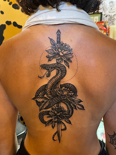 Explore men's inner bicep tattoo ideas, creative tattoo ideas in Buffalo, available at True Gloom Tattoo Studio