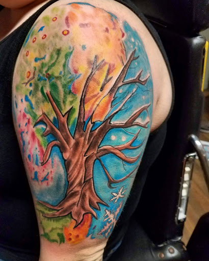 Explore female half sleeve tattoo ideas, creative tattoo ideas in Cumberland, available at Queen City Ink