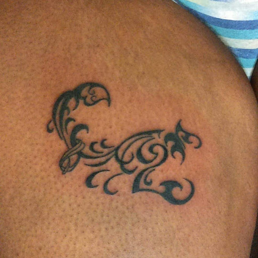 Explore waist tattoo ideas, creative tattoo ideas in Raleigh, available at Gifted Styles