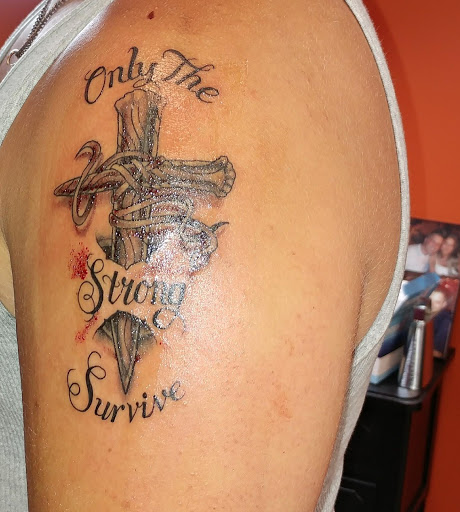 Explore rottweiler tattoo ideas, creative tattoo ideas in Midland, available at Black Ball Tattoo