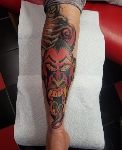 Explore memorial tattoo ideas for mom, creative tattoo ideas in Milwaukee, available at Atomic Tattoos