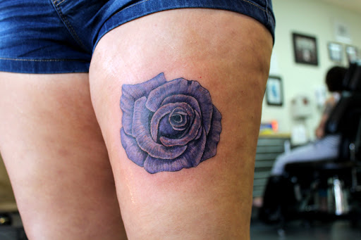 Explore pink floyd tattoo ideas, creative tattoo ideas in Fort Myers, available at Tiger Lotus Tattoo and Piercing
