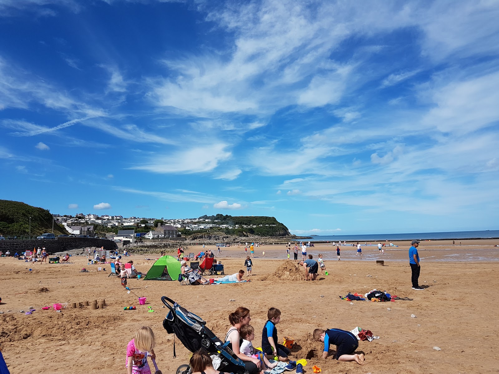 Photo of Benllech Beach with partly clean level of cleanliness