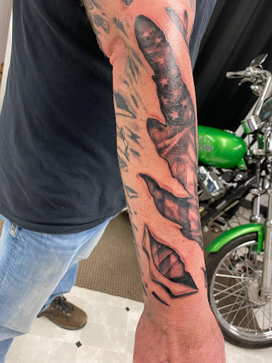 Explore bouquet tattoo ideas, creative tattoo ideas in Orland, available at K1LL3R ARTW0RK