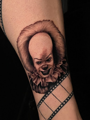 Explore neck tattoo ideas for guys, creative tattoo ideas in Freeport, available at Broken Moon Tattoos