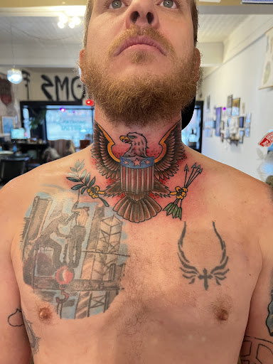 Explore mens wedding band tattoo ideas, creative tattoo ideas in Hannibal, available at Two Fathoms Tattoo