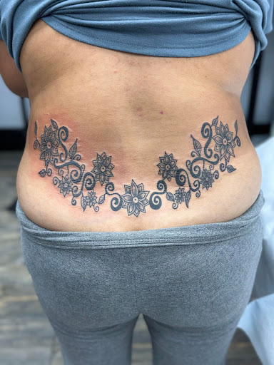Explore chest tattoo lettering ideas, creative tattoo ideas in El Paso, available at American Tattoo Society of Ft Bliss