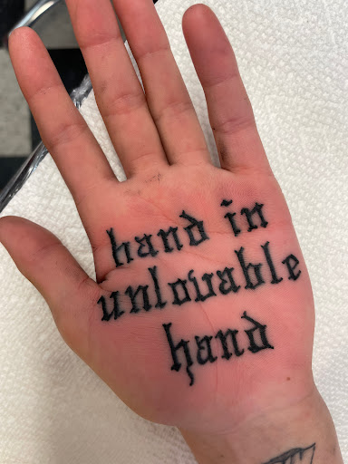 Explore wedding finger tattoo ideas, creative tattoo ideas in Oshkosh, available at Easy Street Tattoo