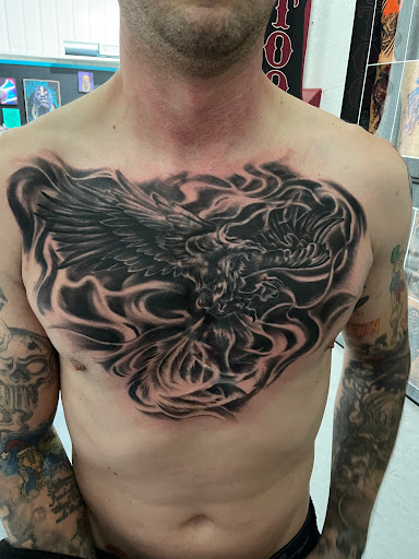 Explore mens cross tattoo ideas, creative tattoo ideas in Weatherford, available at Weatherford Tattoo Co.