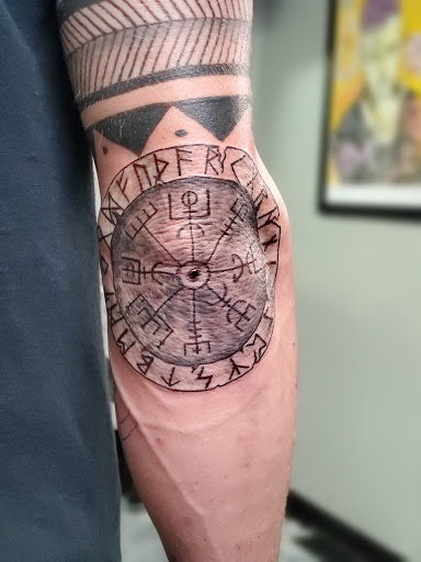 Explore cool arm sleeve tattoo ideas, creative tattoo ideas in Bowling Green, available at The Mad Tatter, L.L.C.