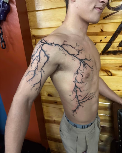 Explore jimmy buffett tattoo ideas, creative tattoo ideas in Foley, available at Symbolic Ink Tattoo Studio