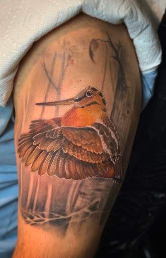 Explore tattoo ideas for shoulder and arm, creative tattoo ideas in Bloomfield, available at Tattoo Garage