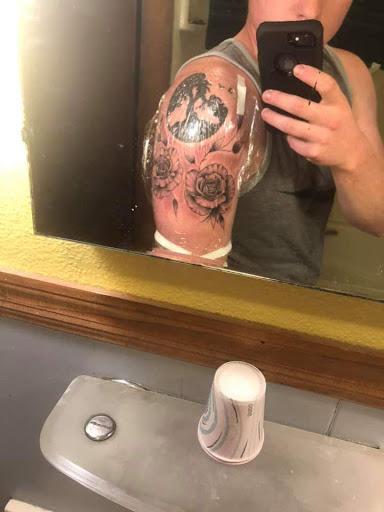 Explore small alien tattoo ideas, creative tattoo ideas in Sioux City, available at Addictive Tattoo-Piercing