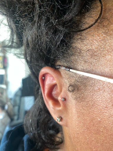 Explore rose tattoo cover up ideas, creative tattoo ideas in Matthews, available at Black Cloud Tattoo and Piercing