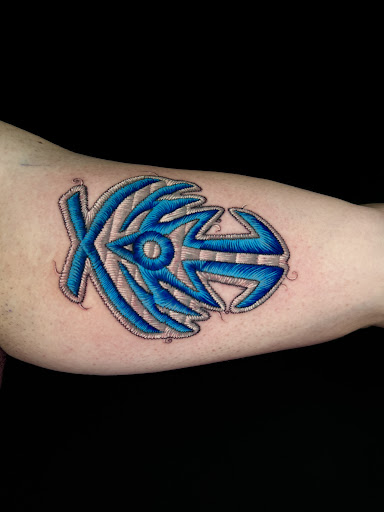 Explore name hand tattoo ideas, creative tattoo ideas in Norcross, available at Brotherhood Tattoo