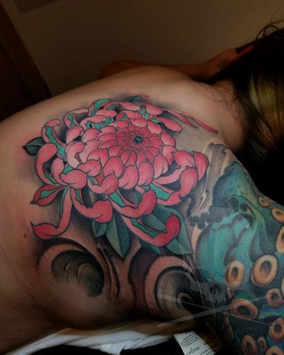 Explore roots tattoo ideas, creative tattoo ideas in Birmingham, available at Revolution Ink