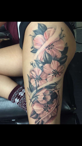 Explore mens back tattoo ideas, creative tattoo ideas in Rockford, available at Euro Tattoo