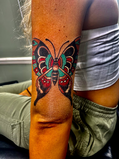 Explore upper arm tattoo ideas for females, creative tattoo ideas in Gadsden, available at Zekez Inkz Tattoos & Piercings