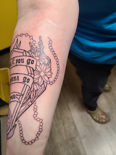 Explore in god we trust tattoo ideas, creative tattoo ideas in Flint, available at Franklins Tattoo and Supply