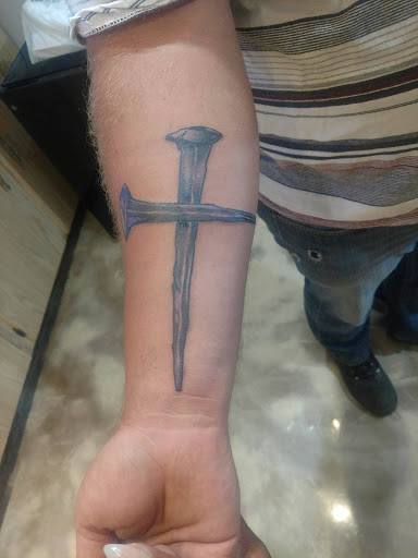 Explore joker card tattoo ideas, creative tattoo ideas in Zephyrhills, available at MAIN STREET INK TATTOOS
