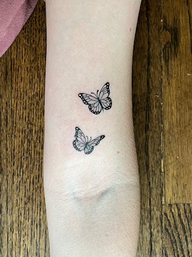 Explore live love laugh tattoo ideas, creative tattoo ideas in West Bloomfield, available at Chroma Tattoo Studio & Laser Tattoo Removal