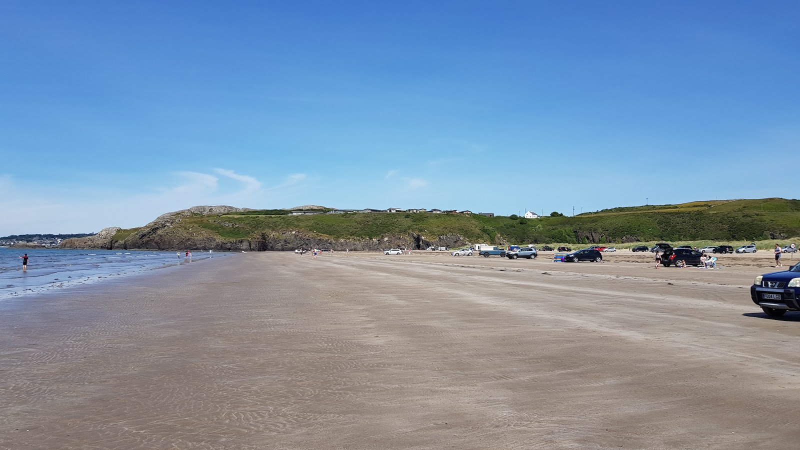Foto von Greenacres beach mit langer gerader strand