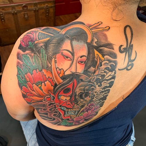 Explore tattoo ideas for female thigh, creative tattoo ideas in Laredo, available at Horikawa Tattoo & Piercing Studios