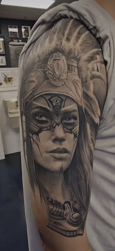 Explore et tattoo ideas, creative tattoo ideas in Buford, available at Inked Arts Tattoo Studio