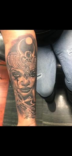 Explore guy shoulder tattoo ideas, creative tattoo ideas in Jamaica, available at Rising Phoenix Ink