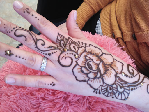 Explore tattoo ideas for dark skin men, creative tattoo ideas in Littleton, available at Artistic Henna Designs