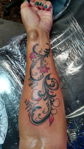 Explore tattoo ideas for girls, creative tattoo ideas in Lincoln, available at Rays Tattoo
